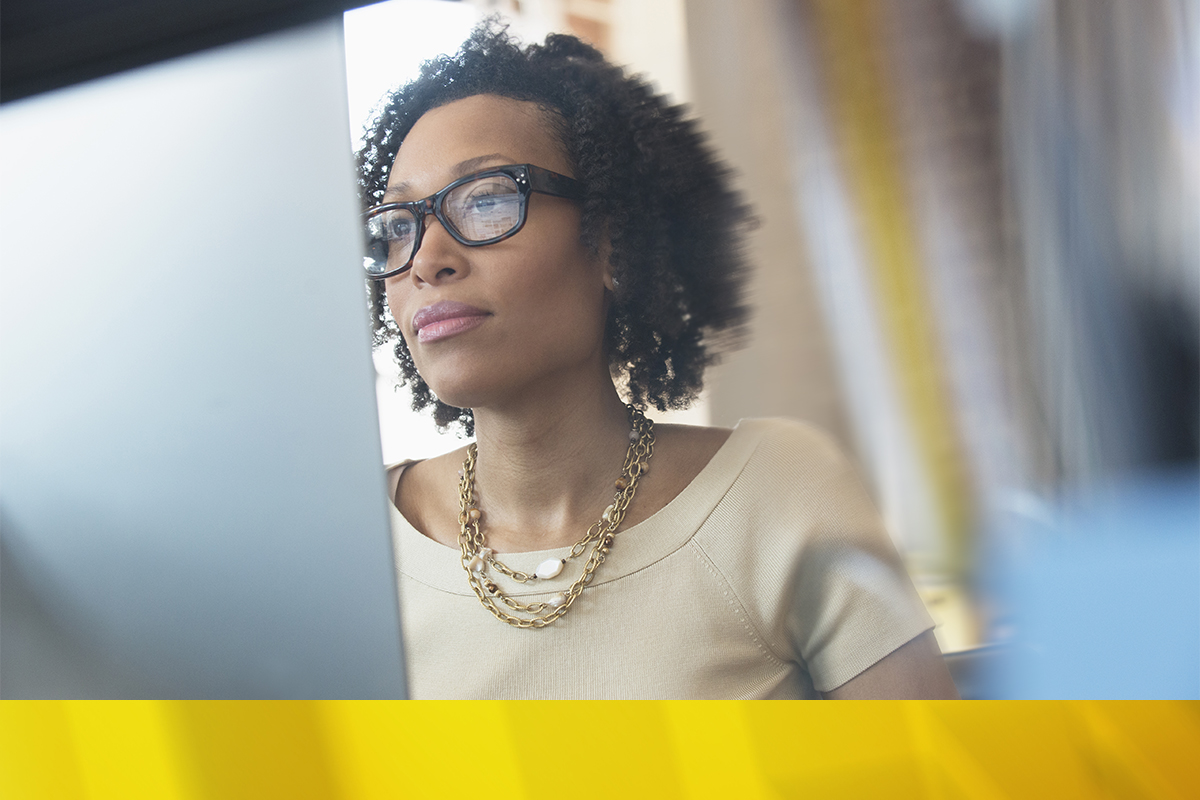 Black woman working on a computer